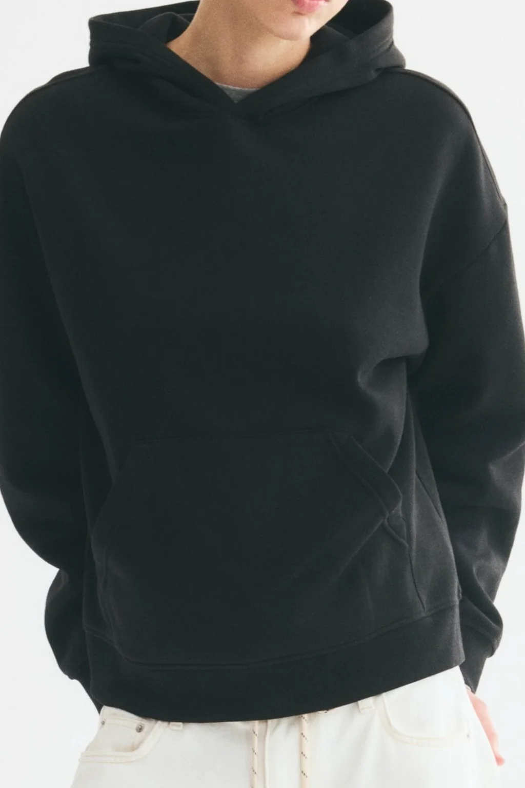 Black pullover hoodie sample for points of measure and fit review