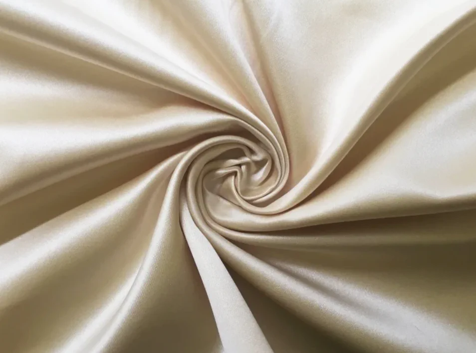 Ivory satin-look smooth woven fabric close-up for premium pajama sets and robes