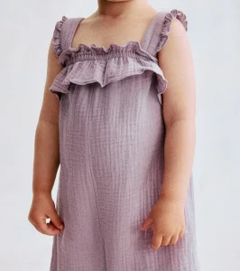 Lilac toddler romper with layered ruffle straps and wide-leg construction