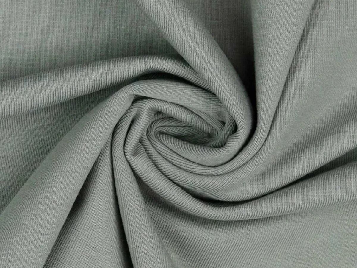 Close-up of fine rib knit fabric folded for material reference