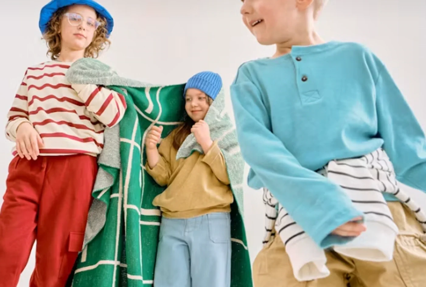 Flat-seam construction detail on kidswear showing a clean internal finish